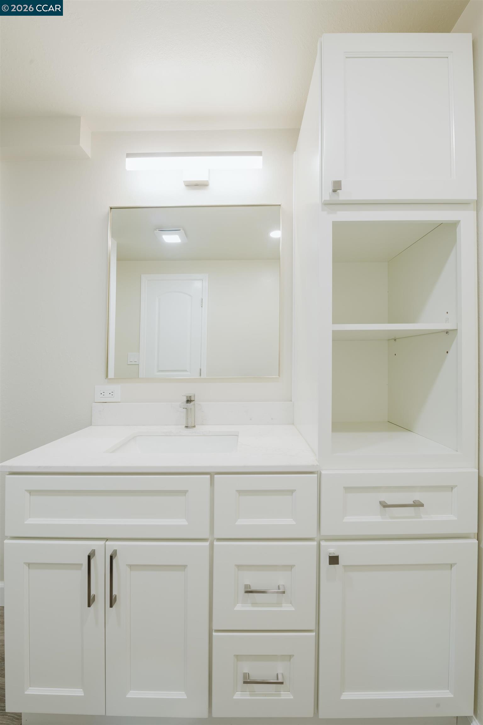 2990 San Pablo Dam Road, Unit 2 San Pablo, CA 94803 - Photo 20 of 41 a bathroom with a sink vanity and a mirror