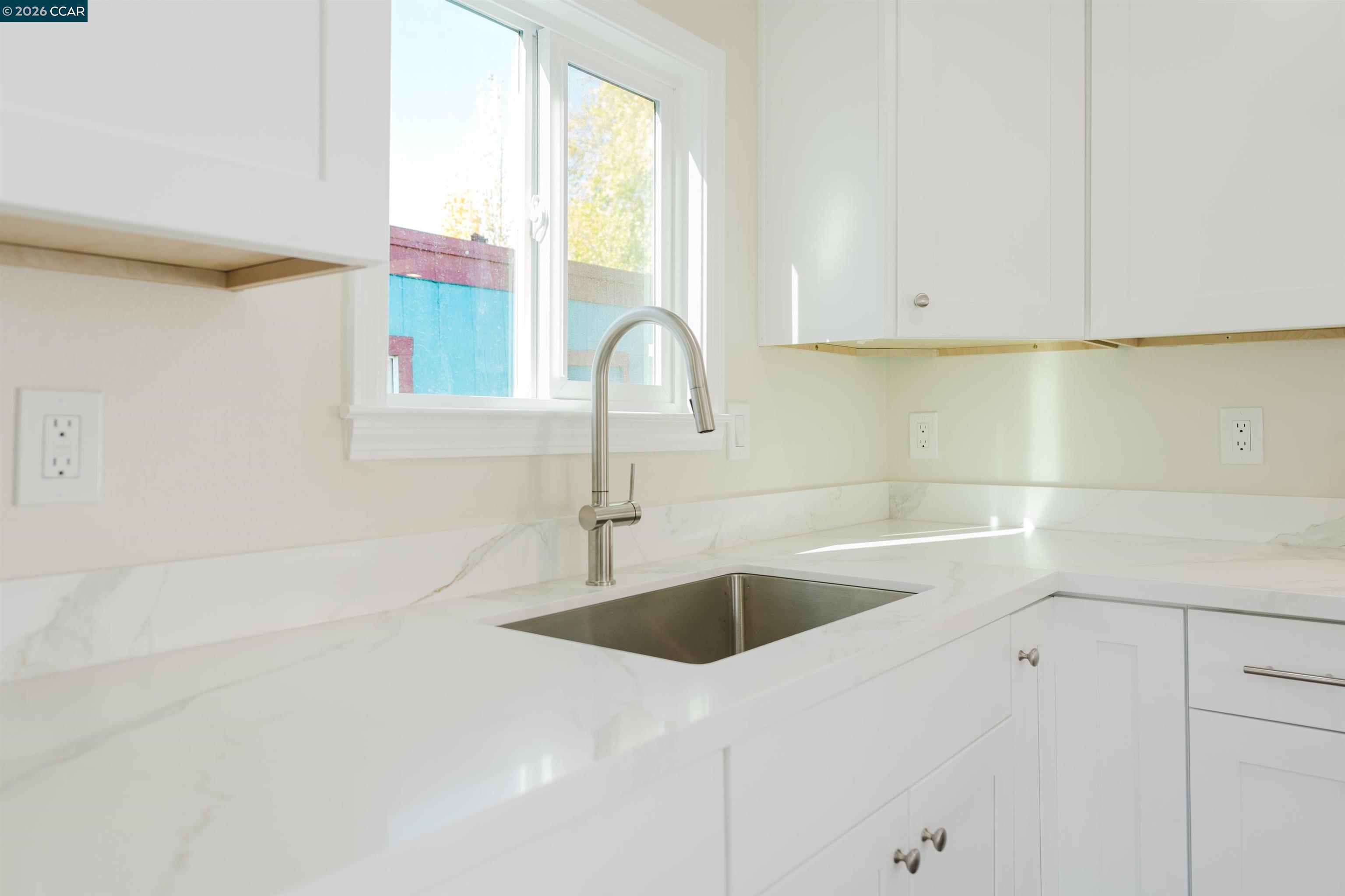 2990 San Pablo Dam Road, Unit 2 San Pablo, CA 94803 - Photo 27 of 41 a kitchen with a sink and cabinets