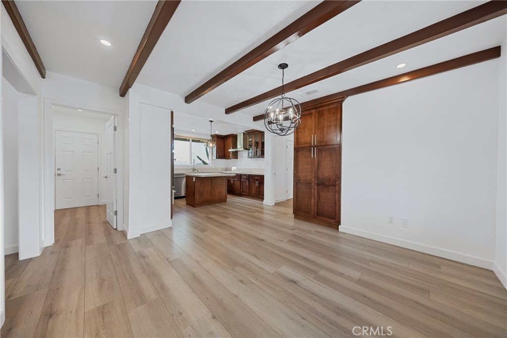 12646 10th Street Yucaipa, CA 92399 - Photo 17 of 72 a view of a livingroom with wooden floor