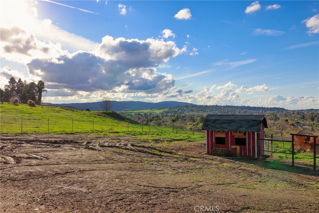 12646 10th Street Yucaipa, CA 92399 - Photo 46 of 72 a view of a house with a porch