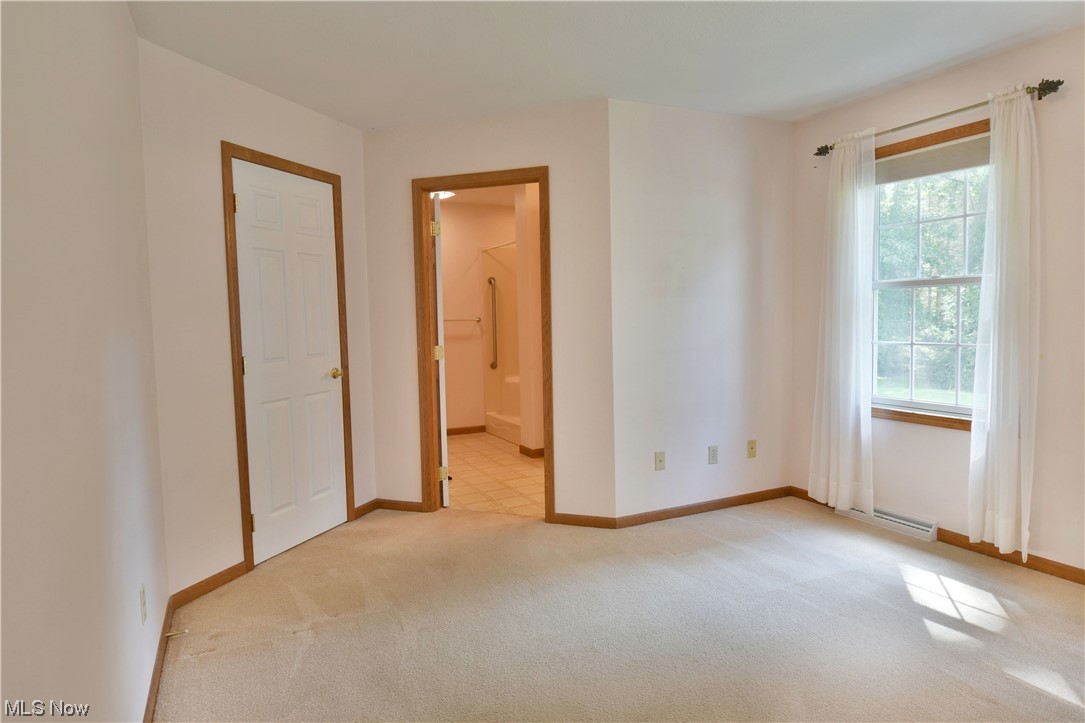 2033 East River Road, Unit 11 Newton Falls, OH 44444 - Photo 21 of 35 View of carpeted bedroom