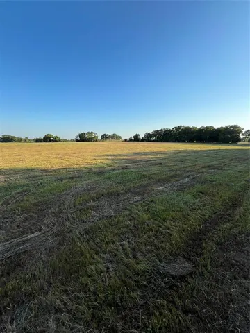 a view of a car in back of a house