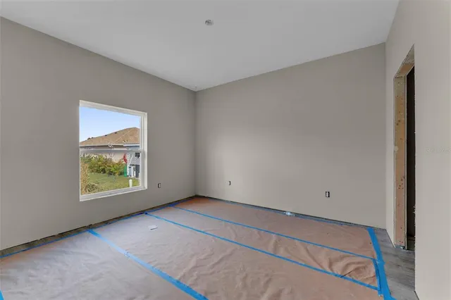 an empty room with windows