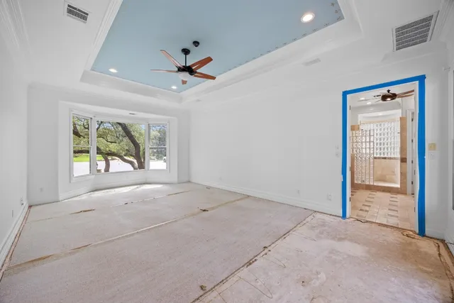 a view of backyard with wooden stairs and seating