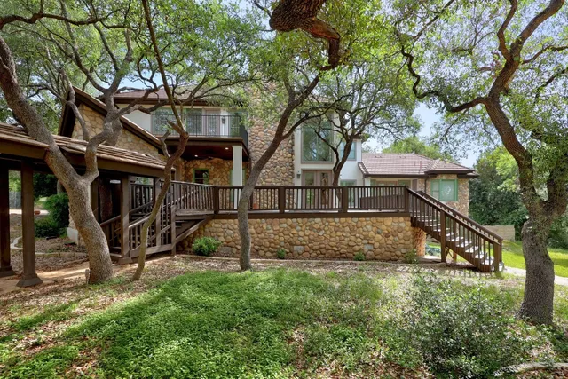 front view of a building with a garden