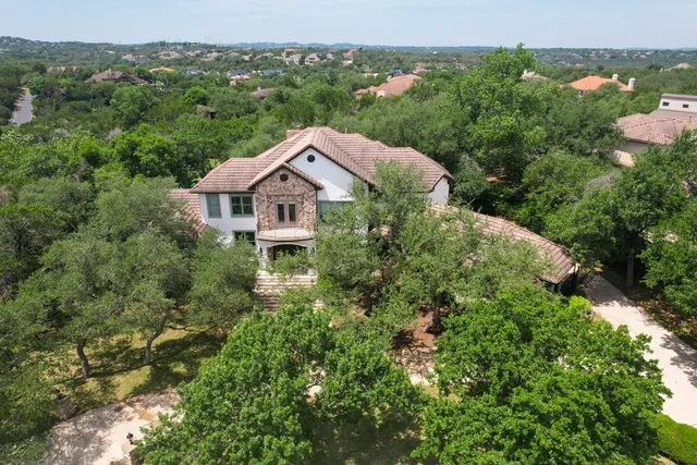 a view of a garden with an outdoor seating
