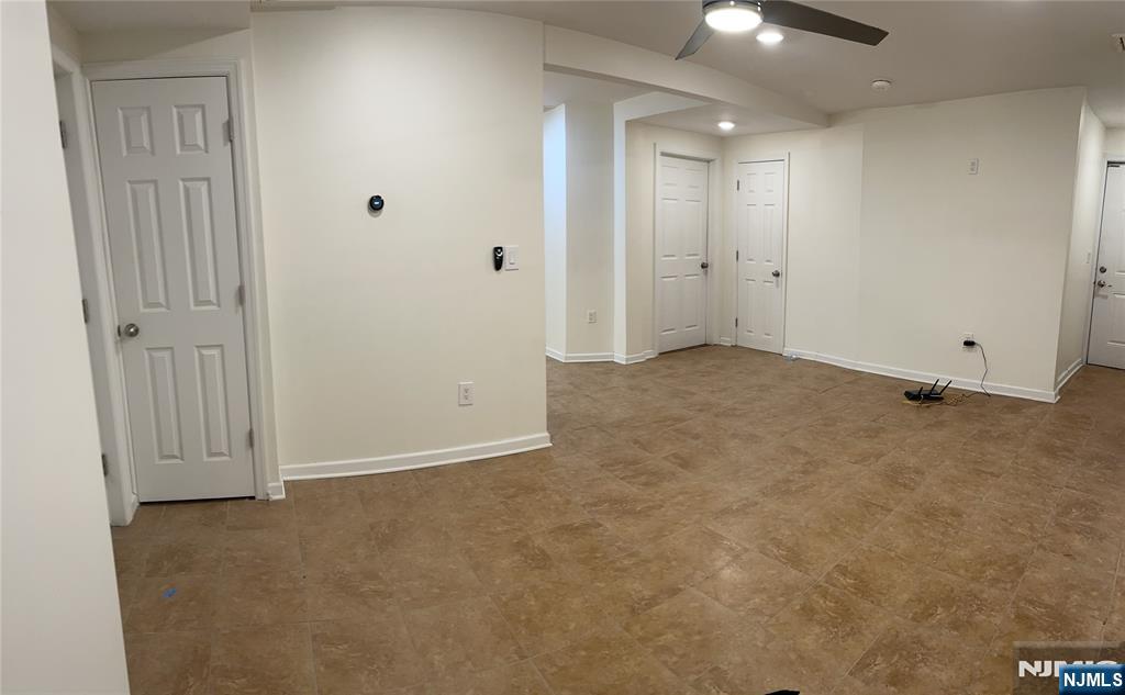 60 Passaic Street Garfield, NJ 07026 - Photo 11 of 14 an empty room with an entryway