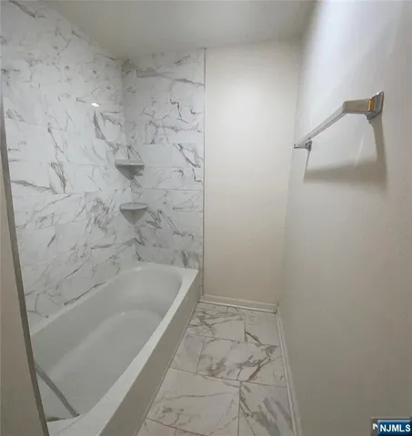 a bathroom with a bathtub