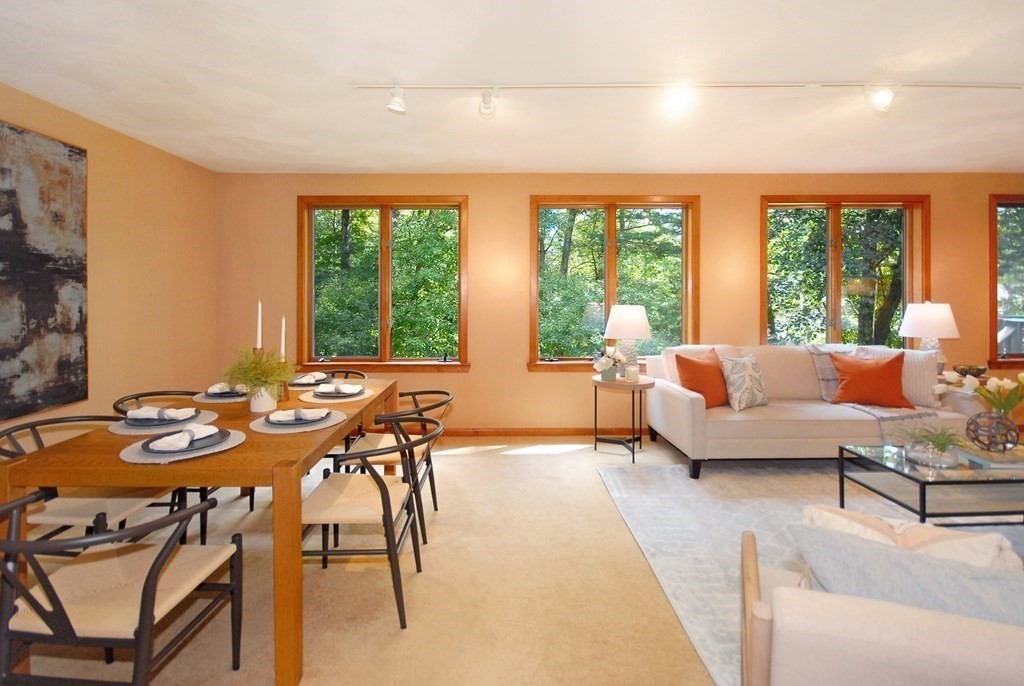 18 Washington Drive Acton, MA 01720 - Photo 13 of 29 a living room with furniture and a large window
