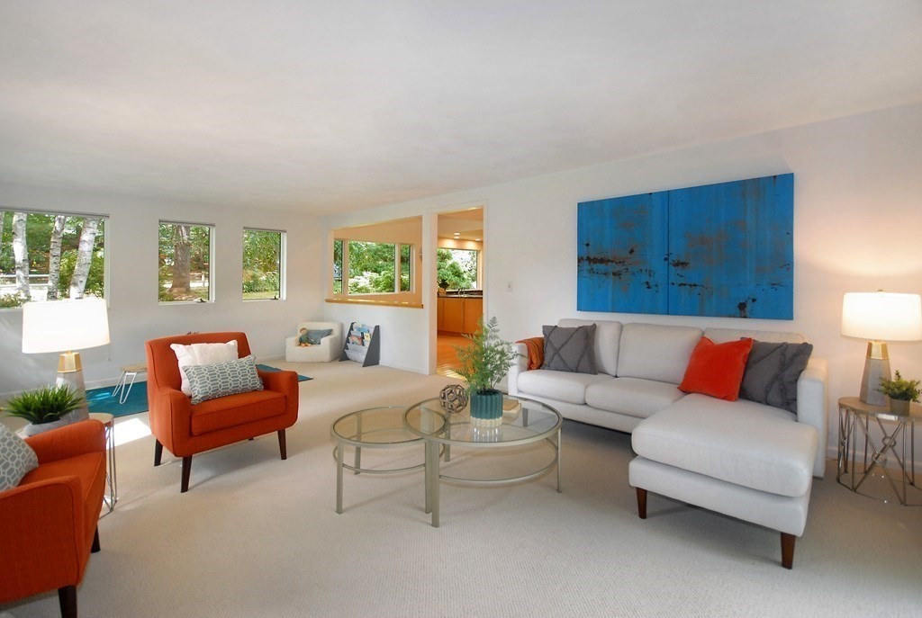 18 Washington Drive Acton, MA 01720 - Photo 4 of 29 a living room with furniture and a large window