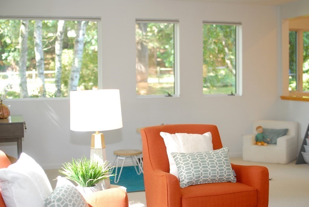 18 Washington Drive Acton, MA 01720 - Photo 7 of 29 a living room with furniture and a large window
