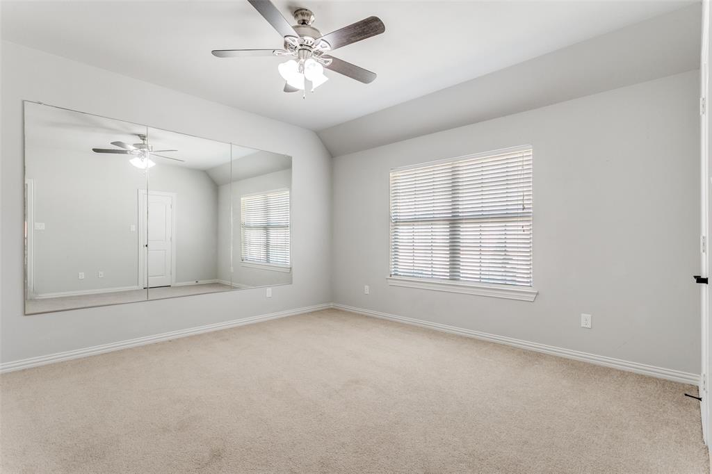 2221 Churchill Loop Grapevine, TX 76051 - Photo 16 of 26 wooden floor in an empty room with a window