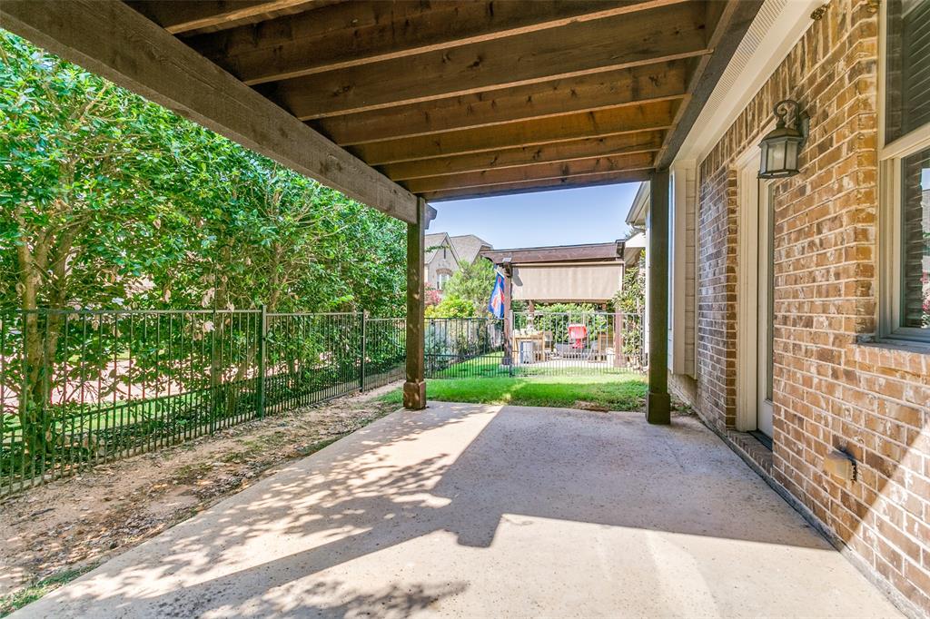 2221 Churchill Loop Grapevine, TX 76051 - Photo 20 of 26 a view of a porch with a yard