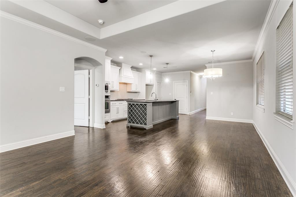 2221 Churchill Loop Grapevine, TX 76051 - Photo 6 of 26 a view of a kitchen with a sink and a stove top oven