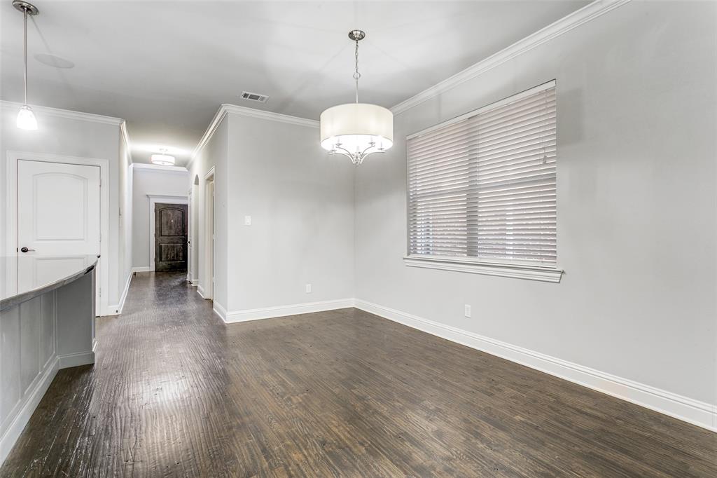 2221 Churchill Loop Grapevine, TX 76051 - Photo 7 of 26 a view of an empty room with wooden floor and a window