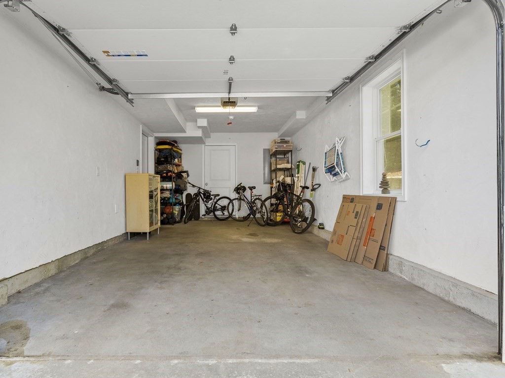 38 Webster Street, Unit 1 Needham, MA 02494 - Photo 24 of 35 a view of a livingroom with furniture and a window