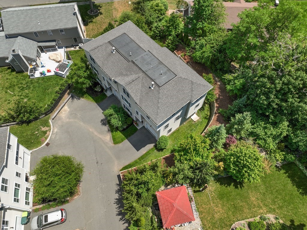 38 Webster Street, Unit 1 Needham, MA 02494 - Photo 28 of 35 an aerial view of a house with a yard basket ball court and outdoor seating