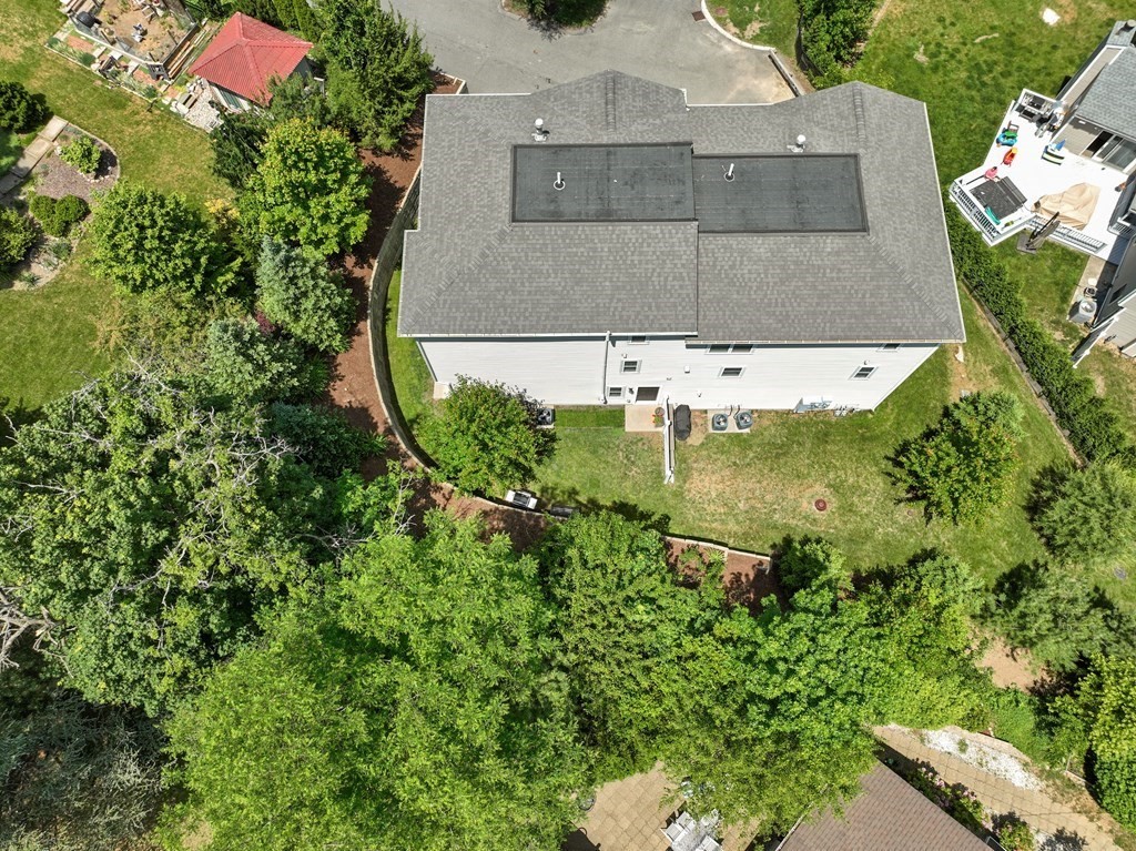 38 Webster Street, Unit 1 Needham, MA 02494 - Photo 29 of 35 an aerial view of a house with a yard