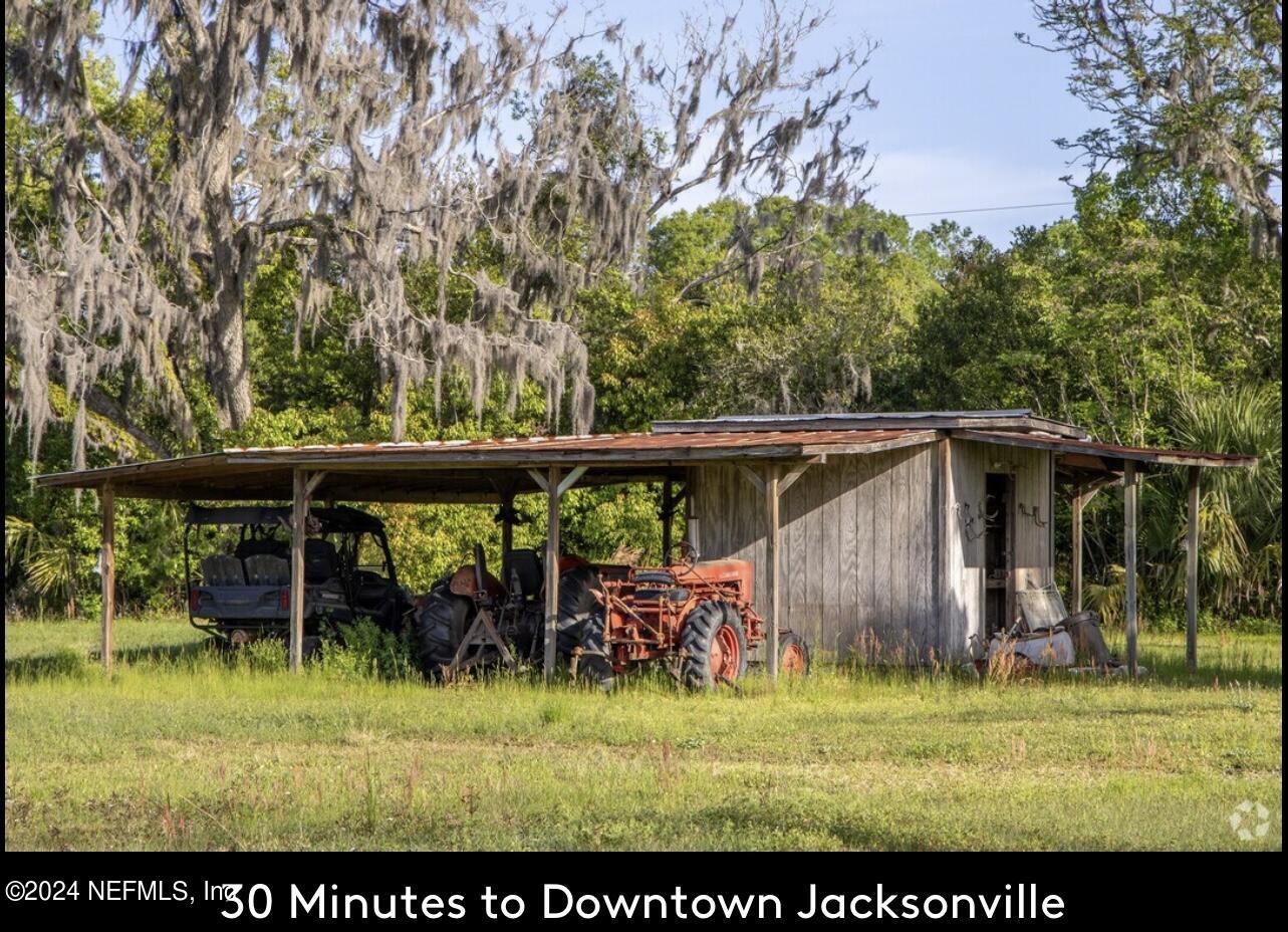 5464 George Hodges Road Macclenny, FL 32063 - Photo 17 of 23 a view of an outdoor space with furniture