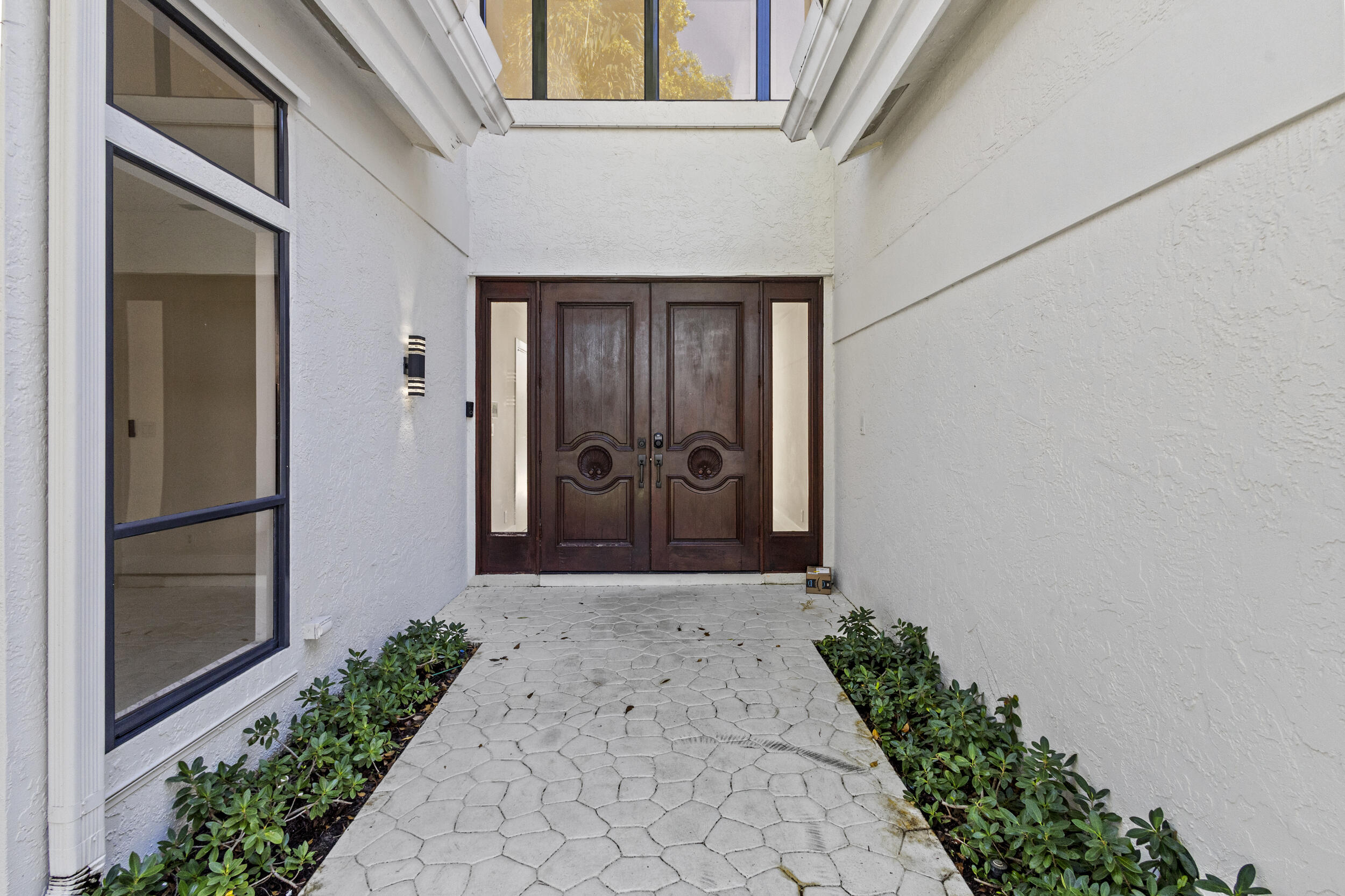 4798 Northwest 25th Way Boca Raton, FL 33434 - Photo 2 of 41 a front view of a house