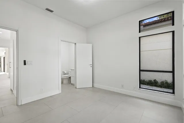 an empty room with windows