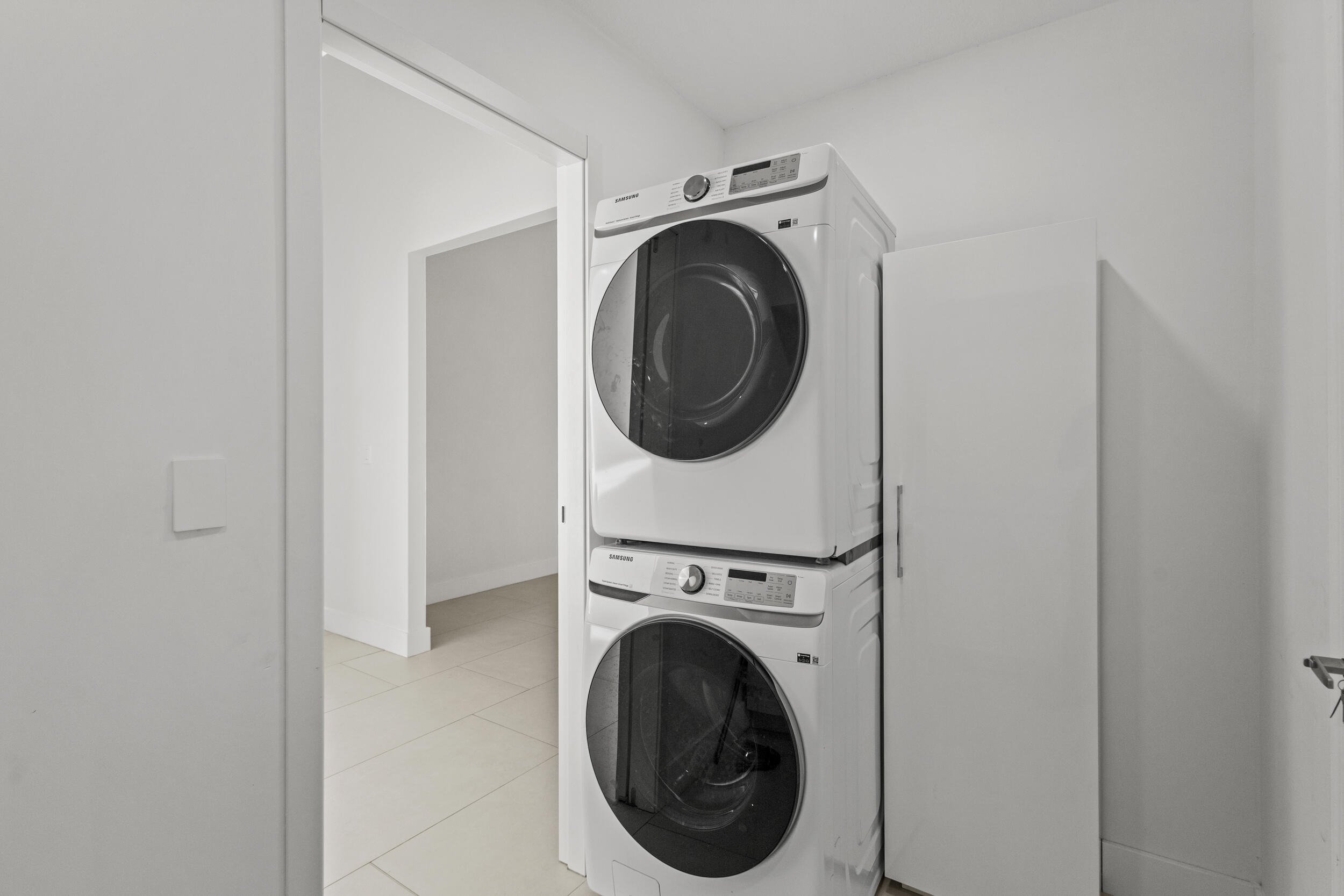 4798 Northwest 25th Way Boca Raton, FL 33434 - Photo 33 of 41 a utility room with dryer and washer