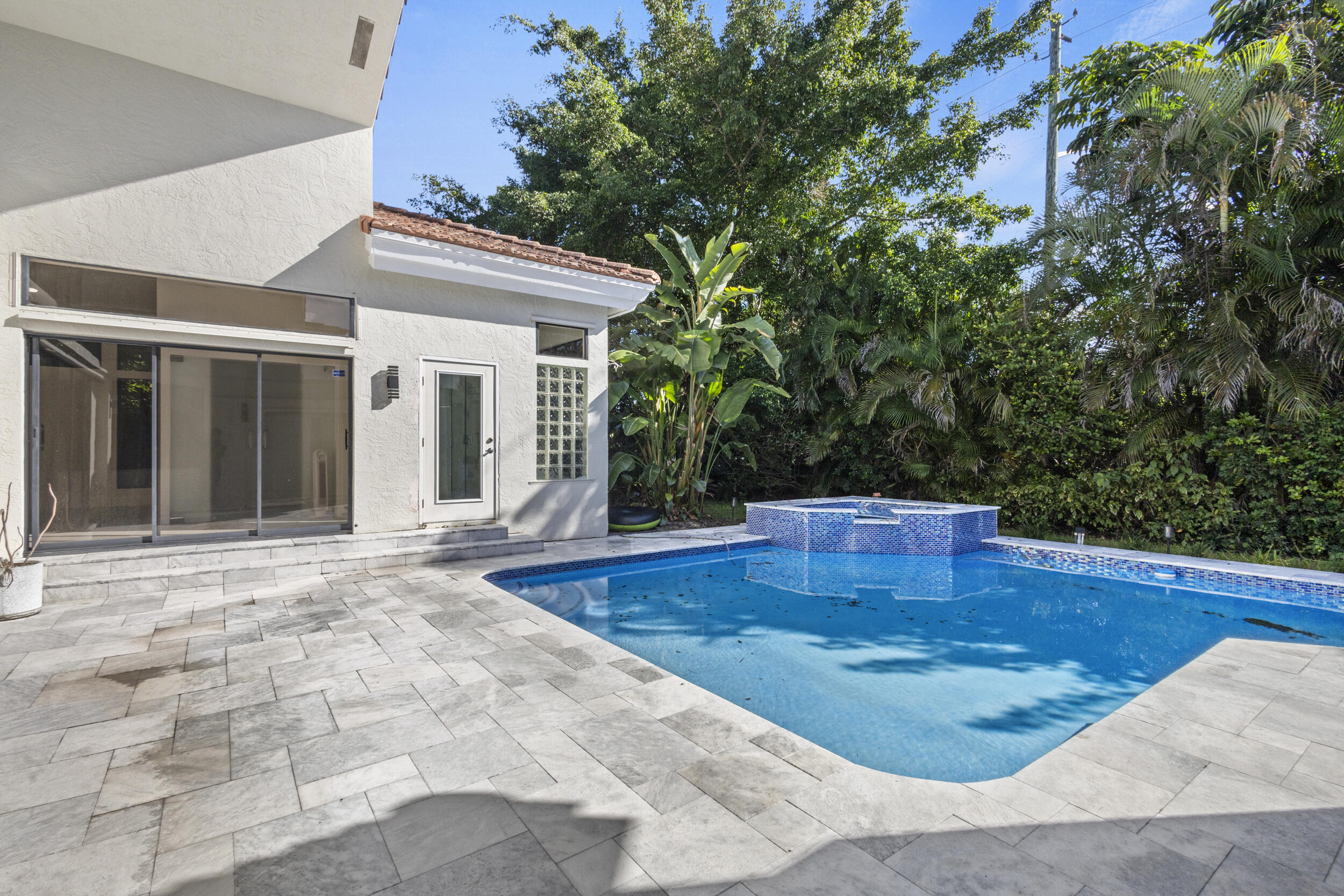 4798 Northwest 25th Way Boca Raton, FL 33434 - Photo 36 of 41 a view of a house with backyard and sitting area