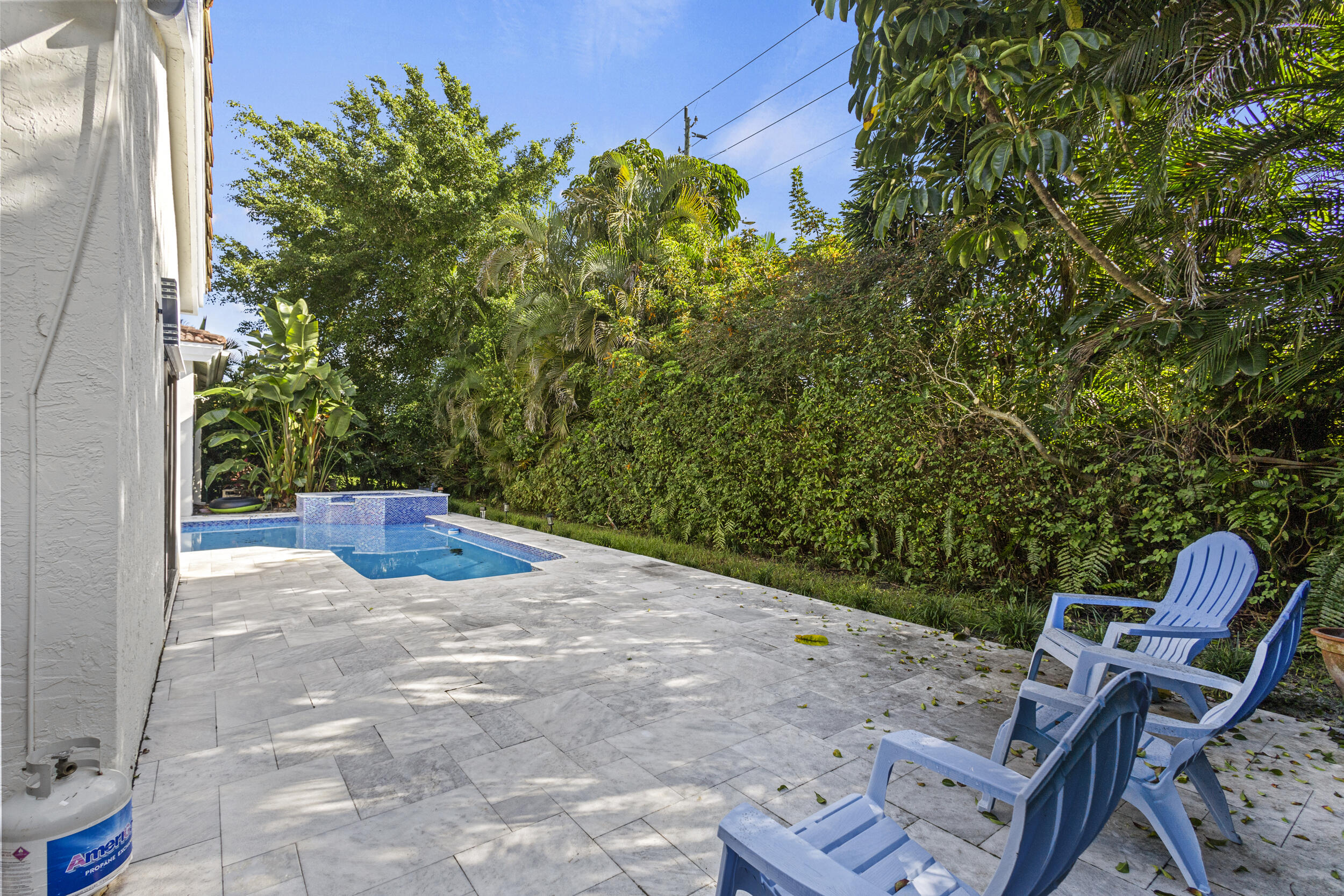 4798 Northwest 25th Way Boca Raton, FL 33434 - Photo 38 of 41 a view of a chairs and table in the patio