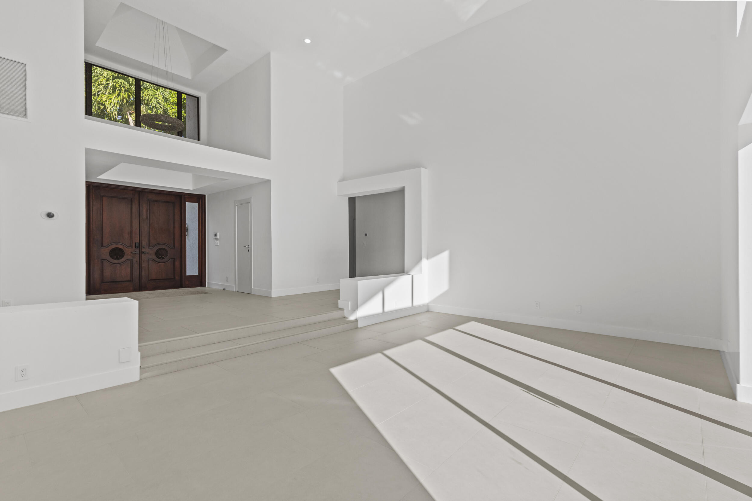 4798 Northwest 25th Way Boca Raton, FL 33434 - Photo 4 of 41 a bedroom with a bed and a fireplace