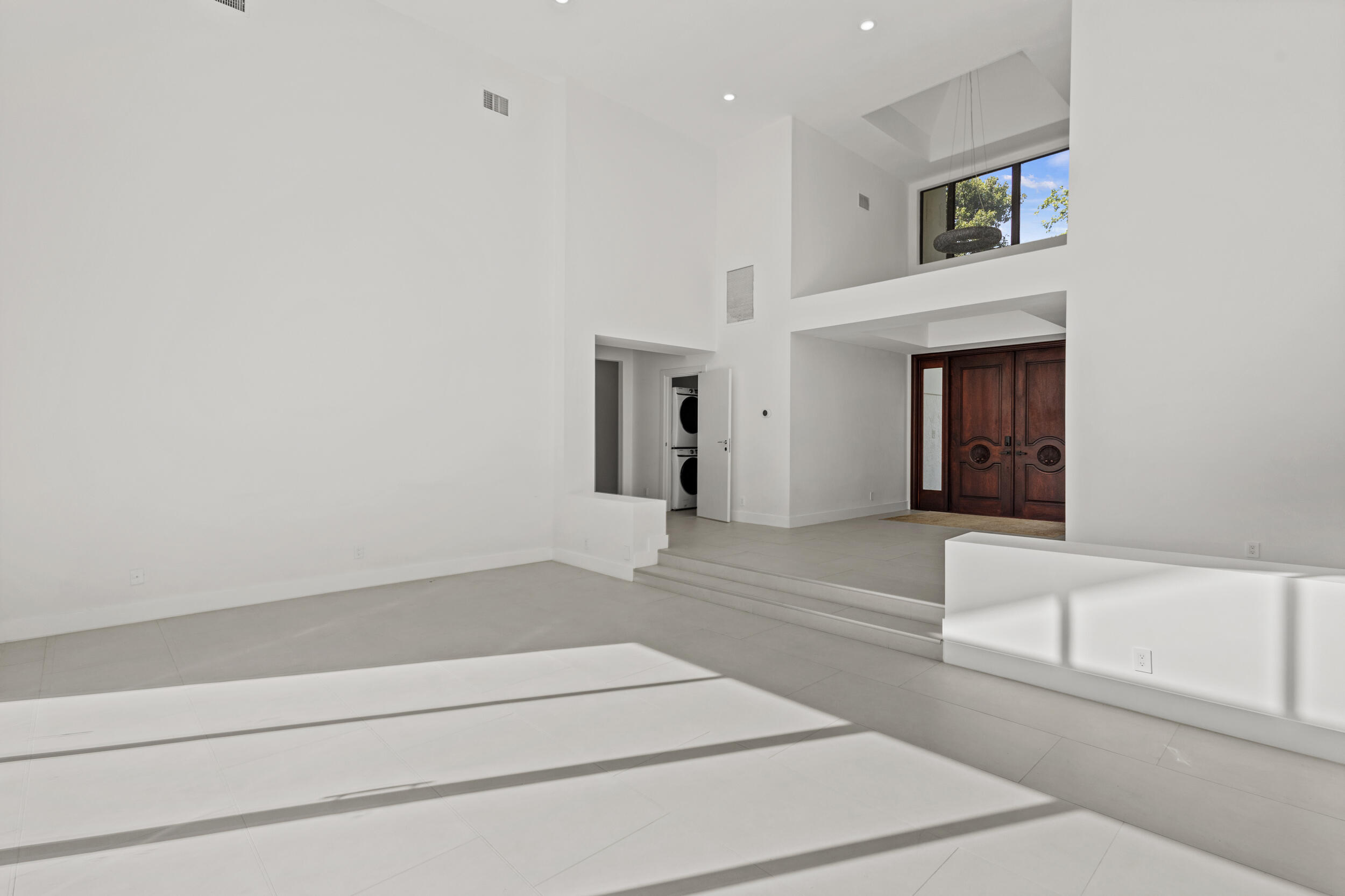 4798 Northwest 25th Way Boca Raton, FL 33434 - Photo 5 of 41 a spacious bathroom with a bathtub and a window