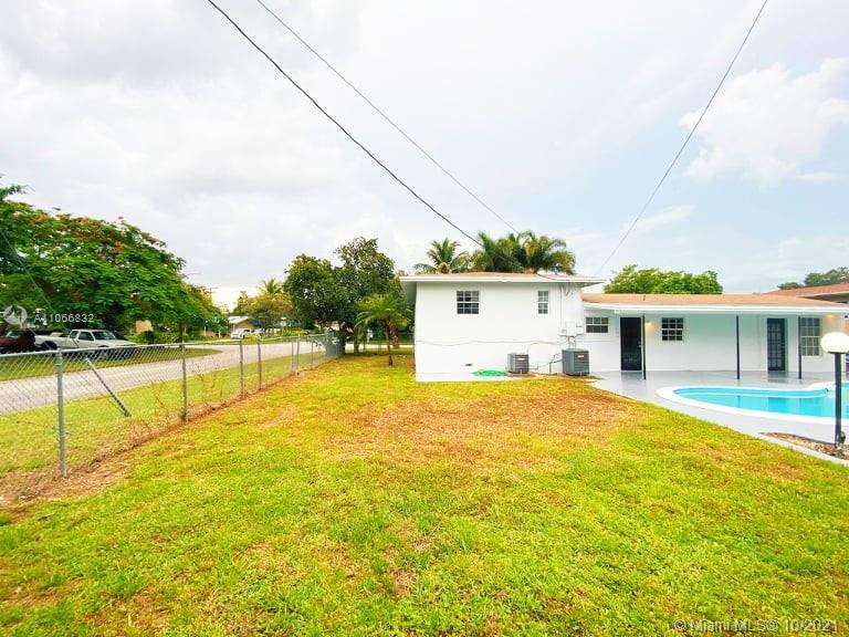 1275 Northeast 204th Terrace Miami, FL 33179 - Photo 11 of 49 a view of a house with pool