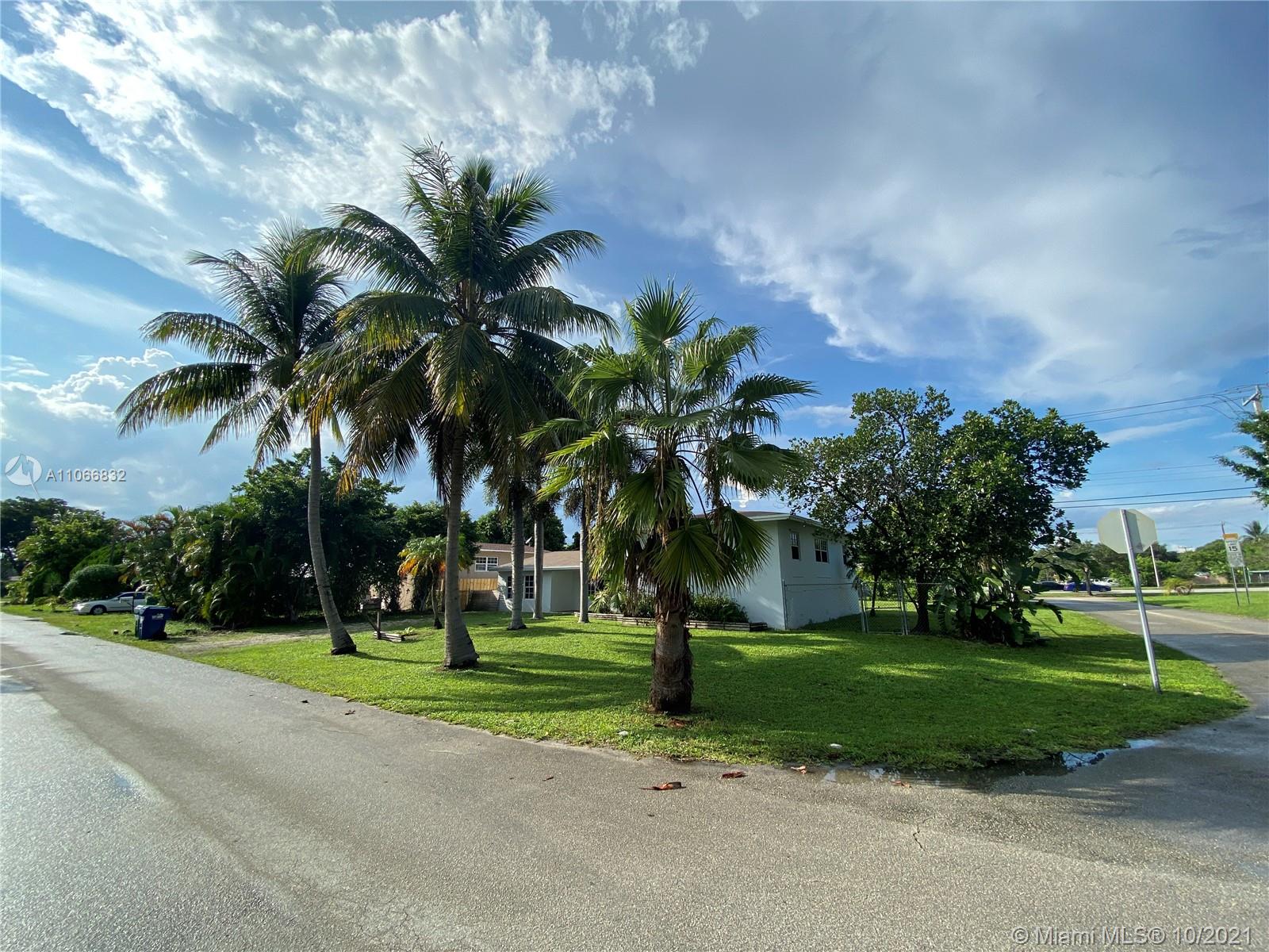 1275 Northeast 204th Terrace Miami, FL 33179 - Photo 35 of 49 a view of a park with palm trees