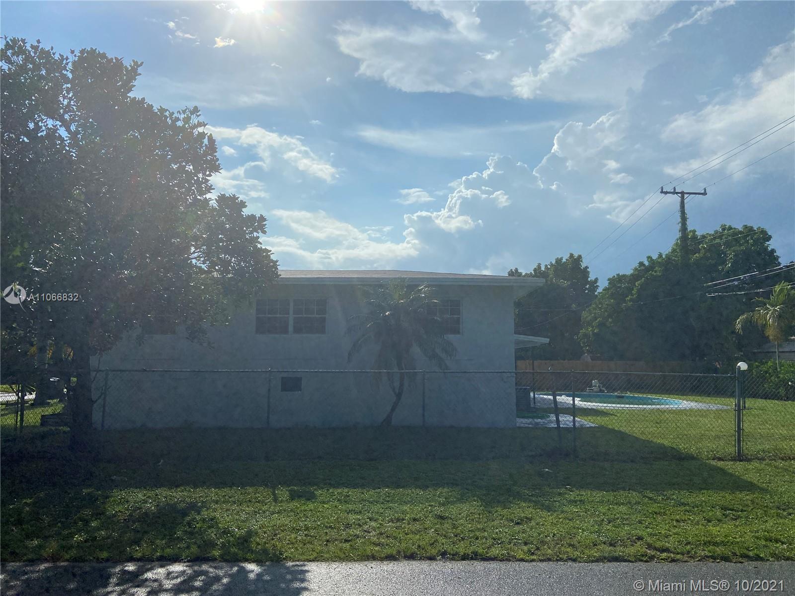 1275 Northeast 204th Terrace Miami, FL 33179 - Photo 40 of 49 a view of a yard