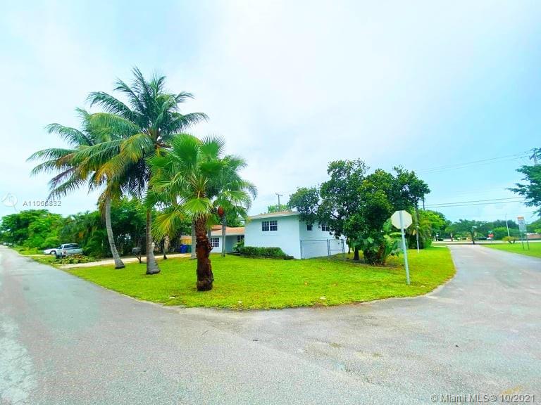 1275 Northeast 204th Terrace Miami, FL 33179 - Photo 5 of 49 a view of a house with a swimming pool