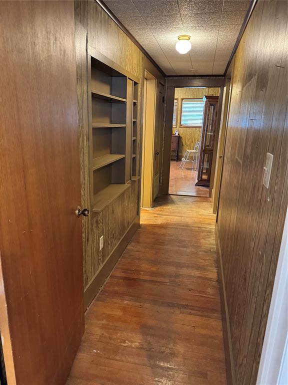 303 East 8th Street Quanah, TX 79252 - Photo 7 of 21 a view of hallway with stairs