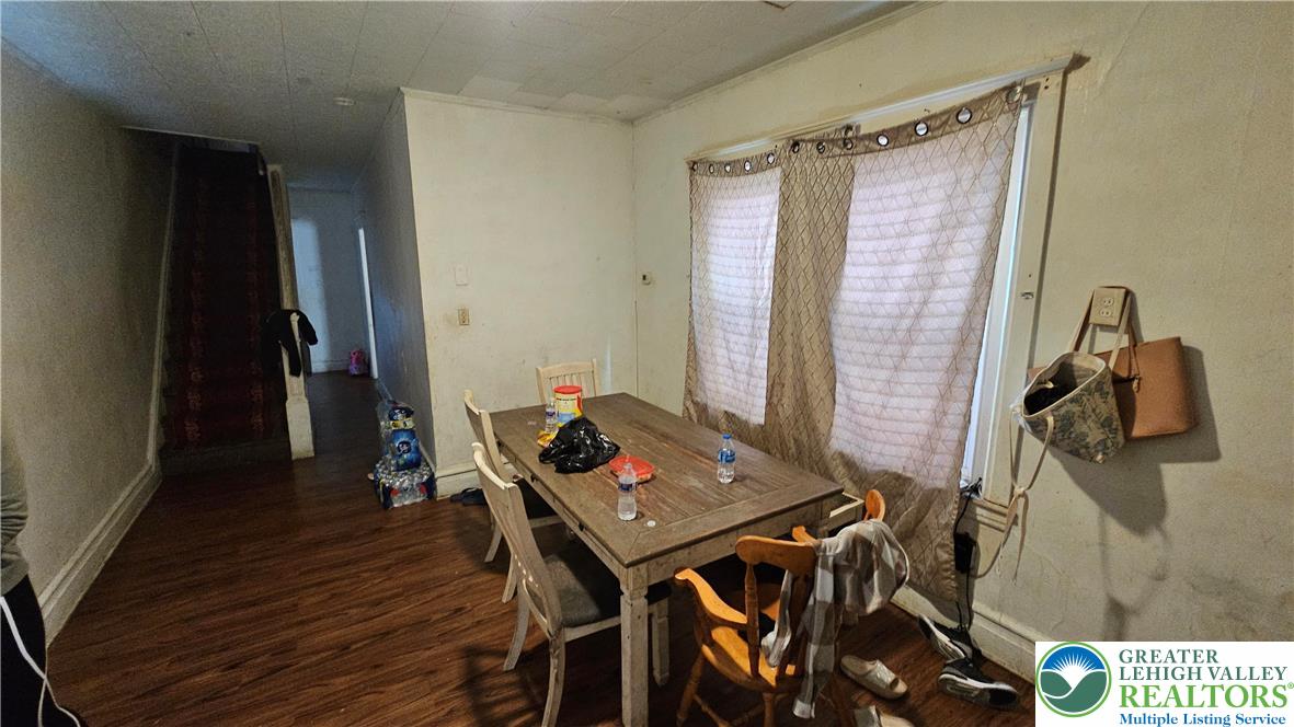 504 Tilghman Street Allentown, PA 18102 - Photo 24 of 33 a view of a workspace with furniture and wooden floor