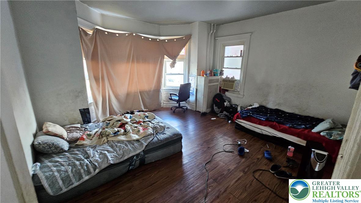 504 Tilghman Street Allentown, PA 18102 - Photo 25 of 33 a bedroom with bed and a window