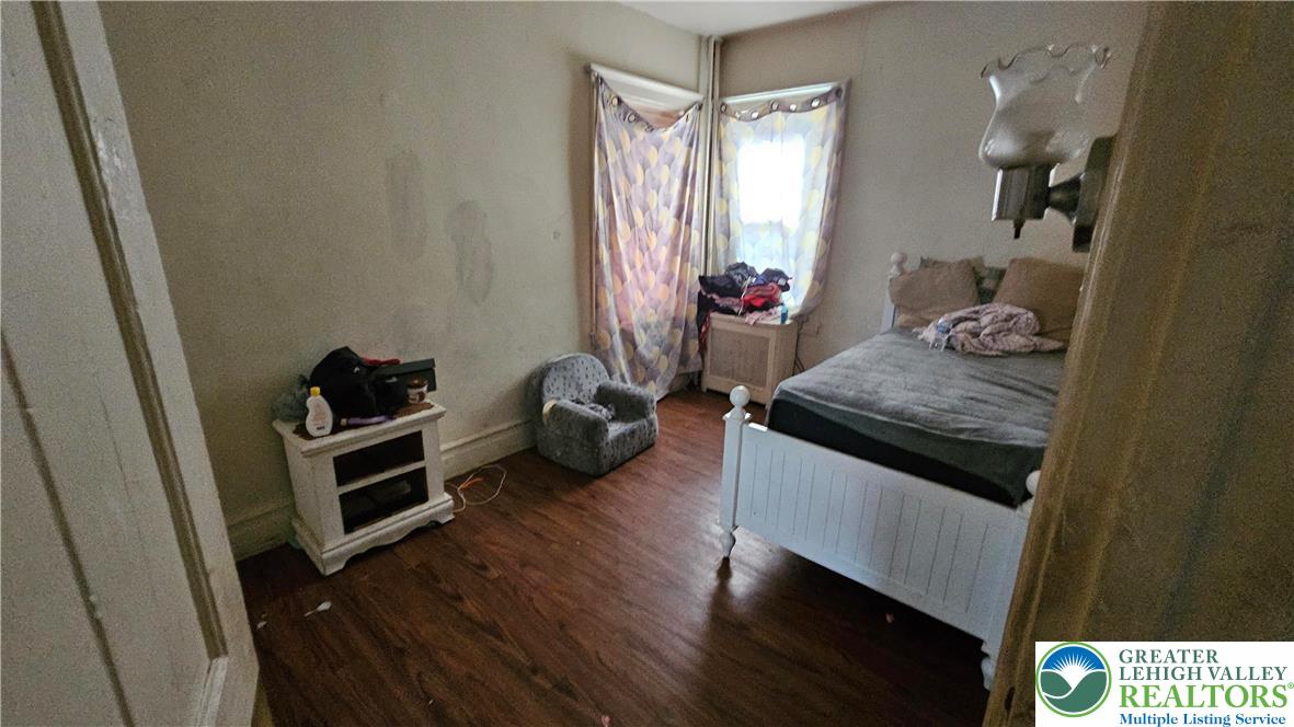 504 Tilghman Street Allentown, PA 18102 - Photo 29 of 33 a living room with furniture and a window