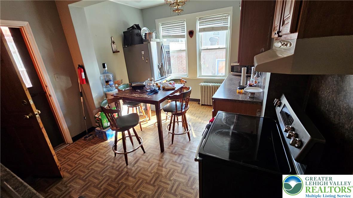 504 Tilghman Street Allentown, PA 18102 - Photo 5 of 33 a view of a livingroom with furniture window and wooden floor