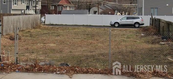 a view of a car parked in front of a house