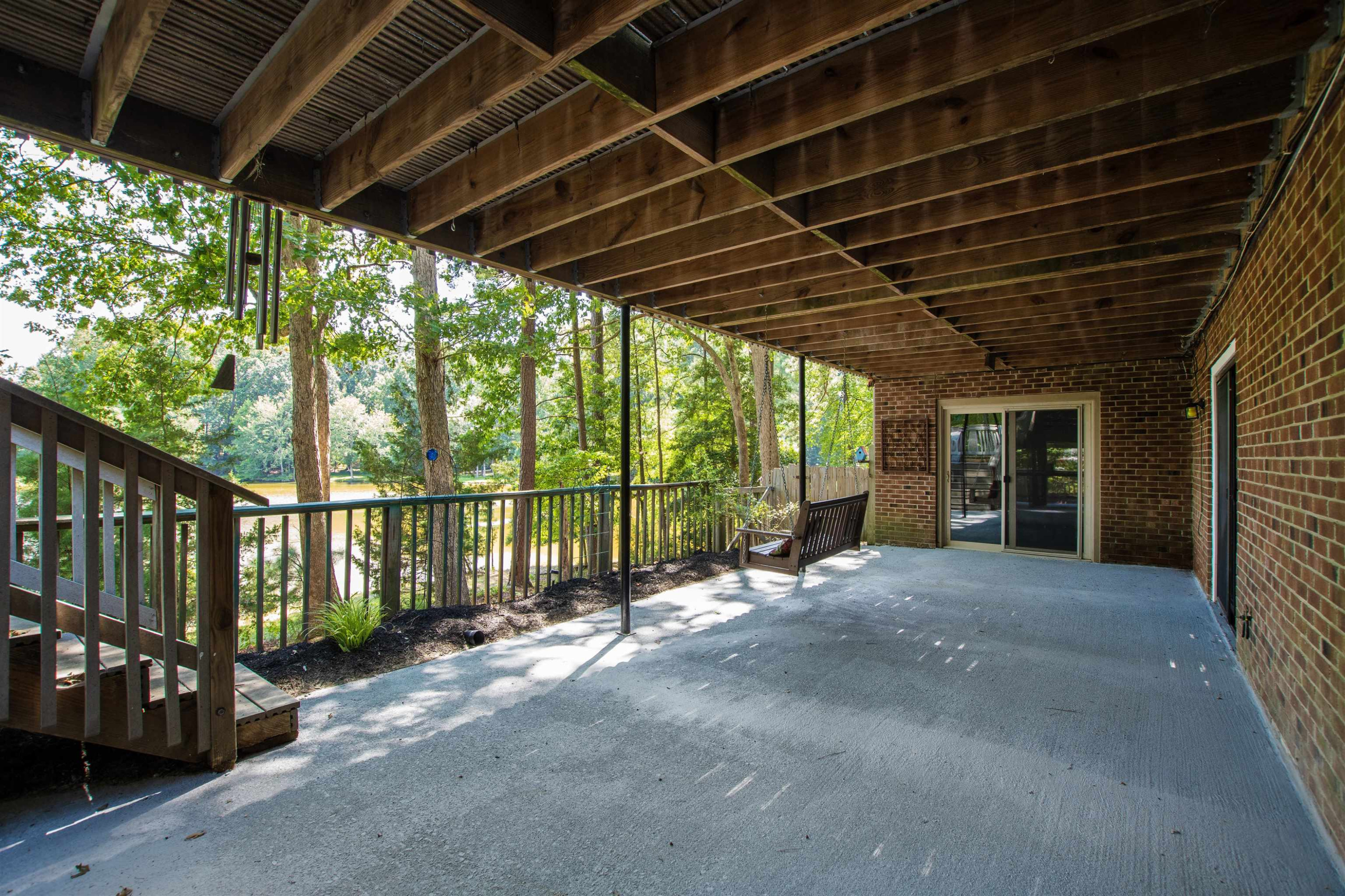 308 Moss Run Raleigh, NC 27614 - Photo 30 of 38 Basement Walk Out Patio and Fenced in Garden