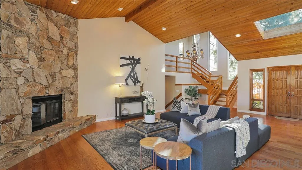 2723 Rich Lynn Ridge Road Escondido, CA 92025 - Photo 5 of 24 a living room with furniture and a fireplace
