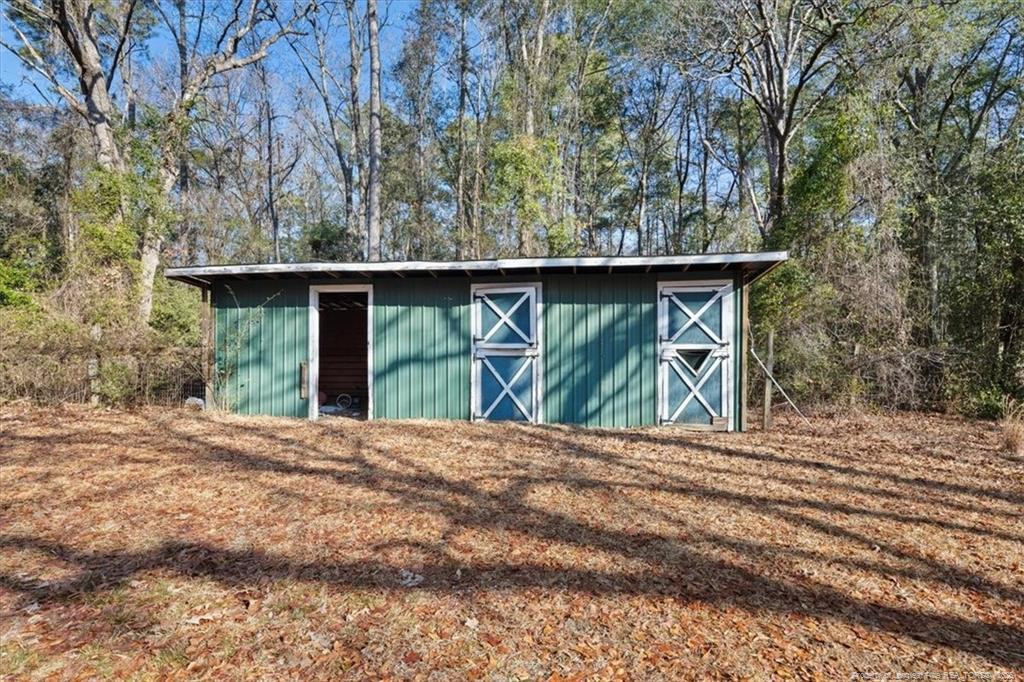 912 Main Street Raeford, NC 28376 - Photo 32 of 36 a front view of a house with garden
