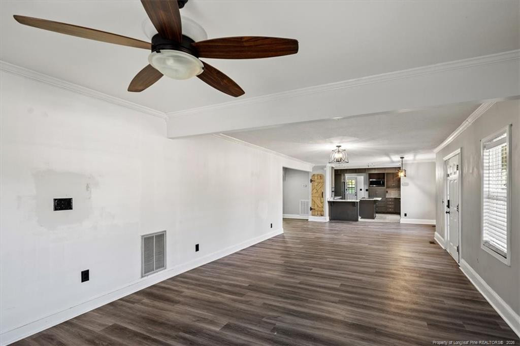 912 Main Street Raeford, NC 28376 - Photo 5 of 36 a view of empty room with wooden floor