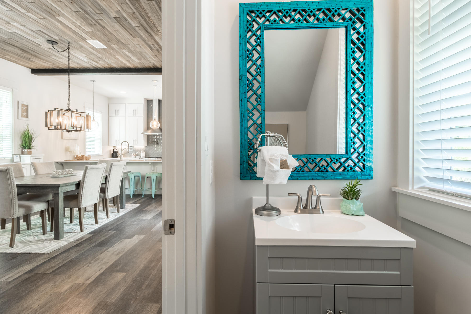 281 Redbud Ln Inlet Beach Inlet Beach, FL 32461 - Photo 18 of 34 a bathroom with a sink and a mirror