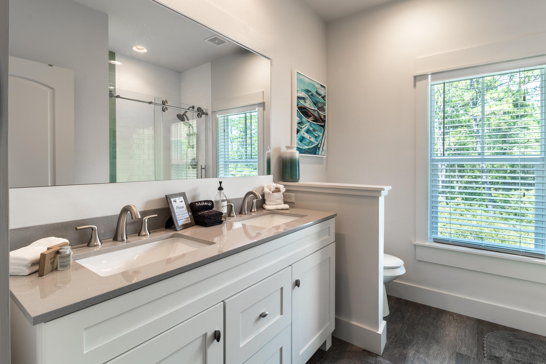 281 Redbud Ln Inlet Beach Inlet Beach, FL 32461 - Photo 21 of 34 a bathroom with double vanity and a mirror
