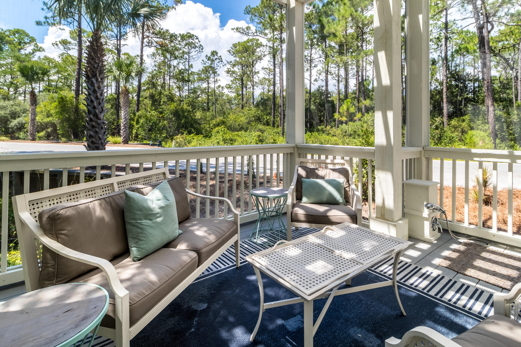 281 Redbud Ln Inlet Beach Inlet Beach, FL 32461 - Photo 26 of 34 a roof deck with couches and wooden floor