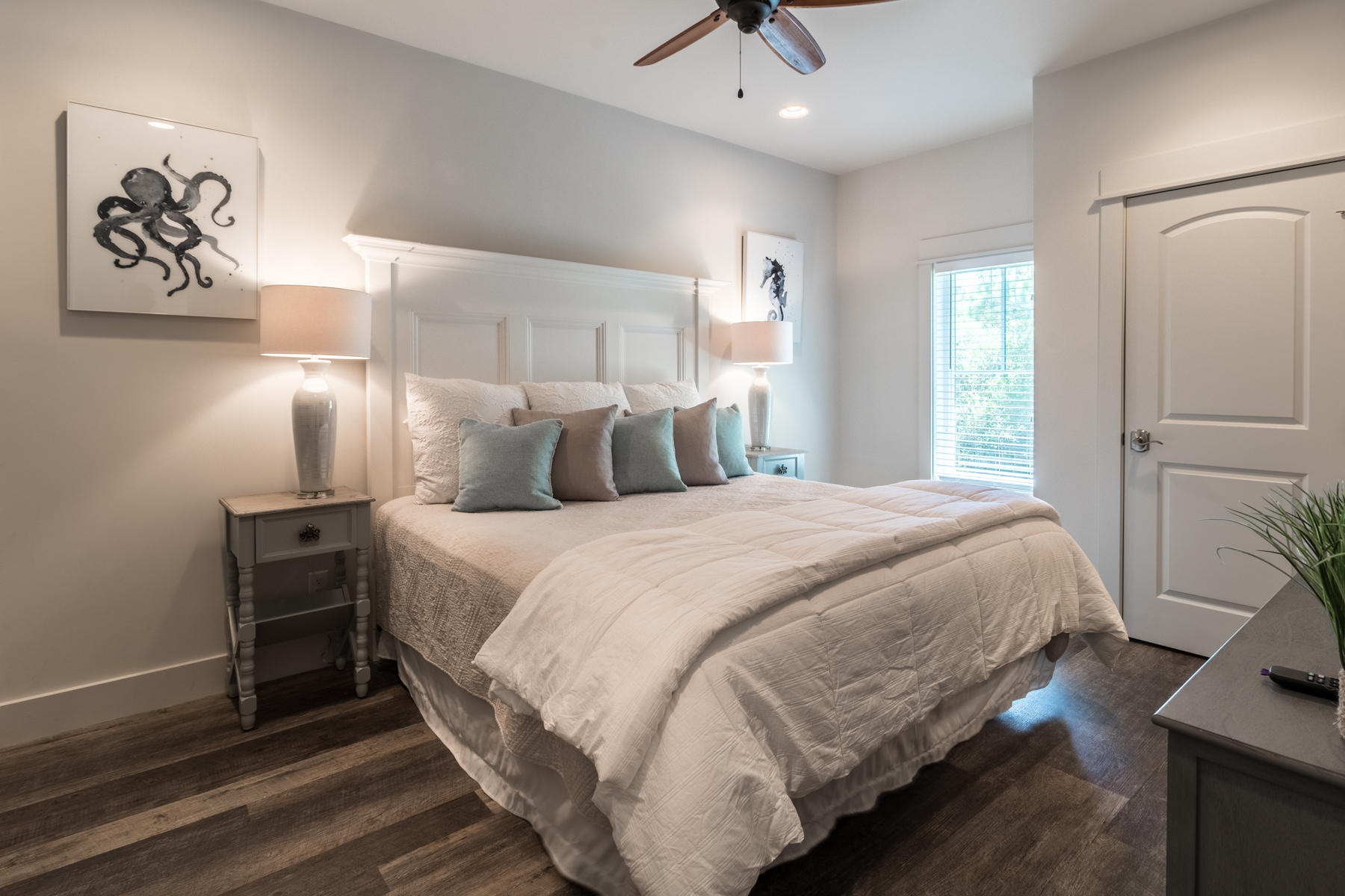 281 Redbud Ln Inlet Beach Inlet Beach, FL 32461 - Photo 9 of 34 a bedroom with a bed and painting on the wall