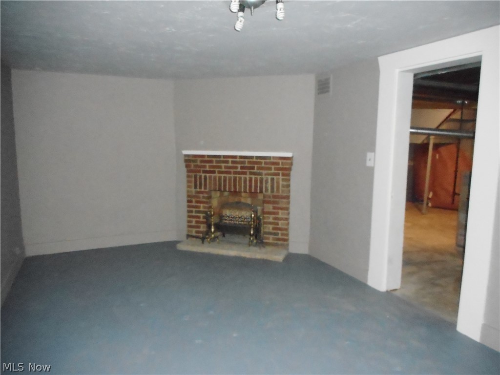 1150 Castleton Road Cleveland Heights, OH 44121 - Photo 18 of 25 This lower level recreation room is great, even another fireplace!