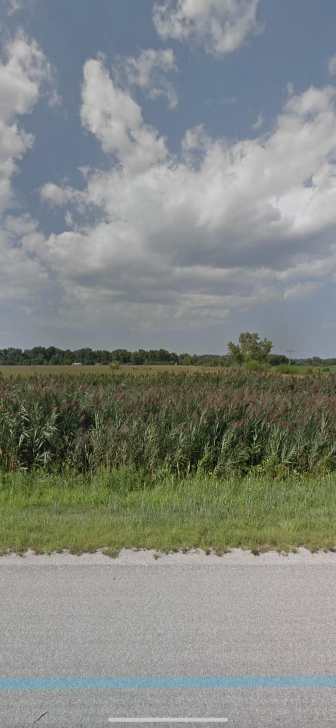 4898 East East State Road Demotte, IN 46310 - Photo 2 of 3 a view of a beach with a big yard